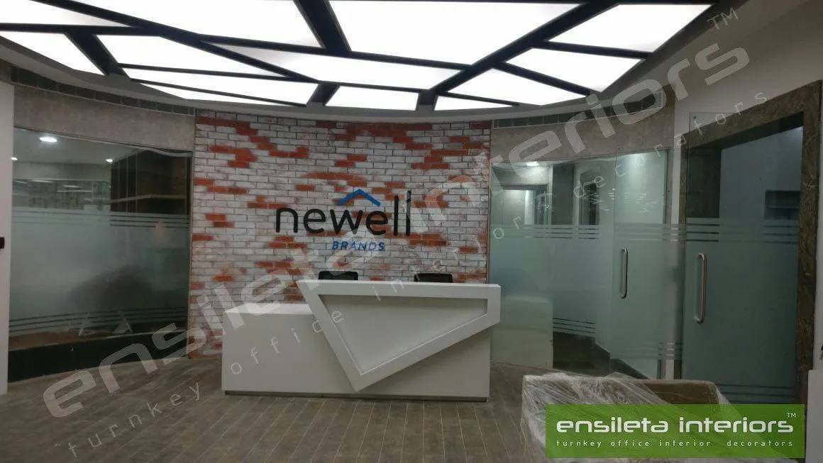Rustic Brick-Accent Branding Wall with Geometric Minimalist Desk Reception Desks Desk and Decor 