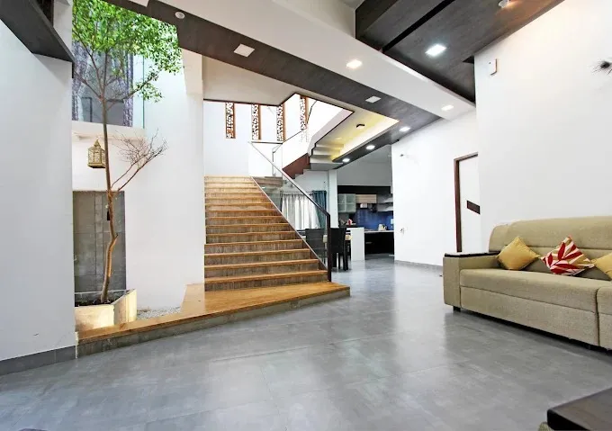 Living Room, Dining Area & Staircase — Open Plan Foyer Modern Living Room Designs Desk and Decor 