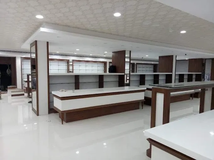 Modern Retail Showroom with Display Counters Large Space Showroom Desk and Decor 