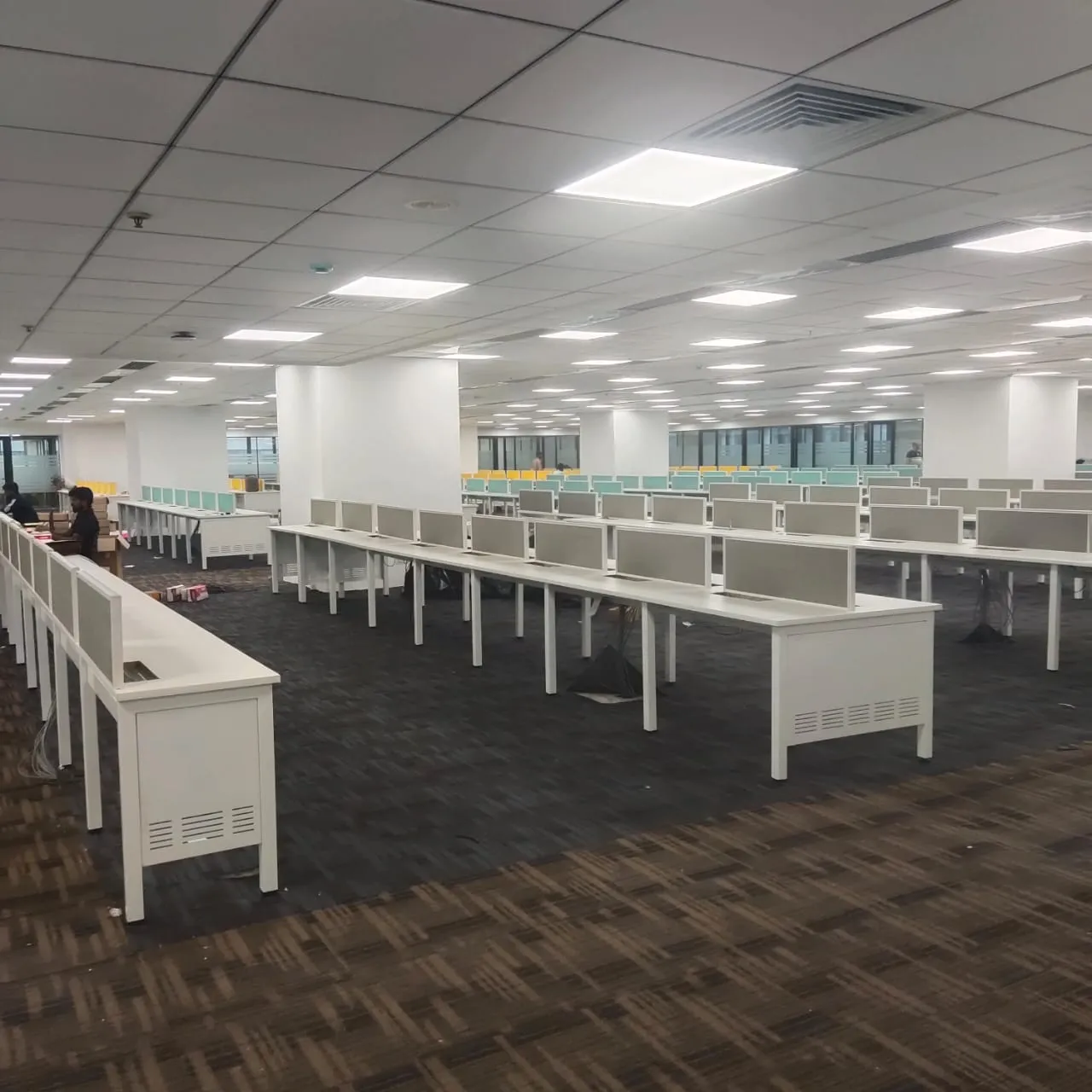 Integrated Branding, Ergonomic Workstations, and Technical Showrooms Open Workspace Offices Desk and Decor 