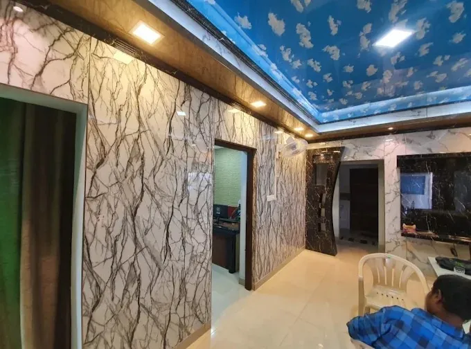 Reception Lobby / Elevator Foyer — Marble Feature Wall TV Unit Focused Design Desk and Decor 
