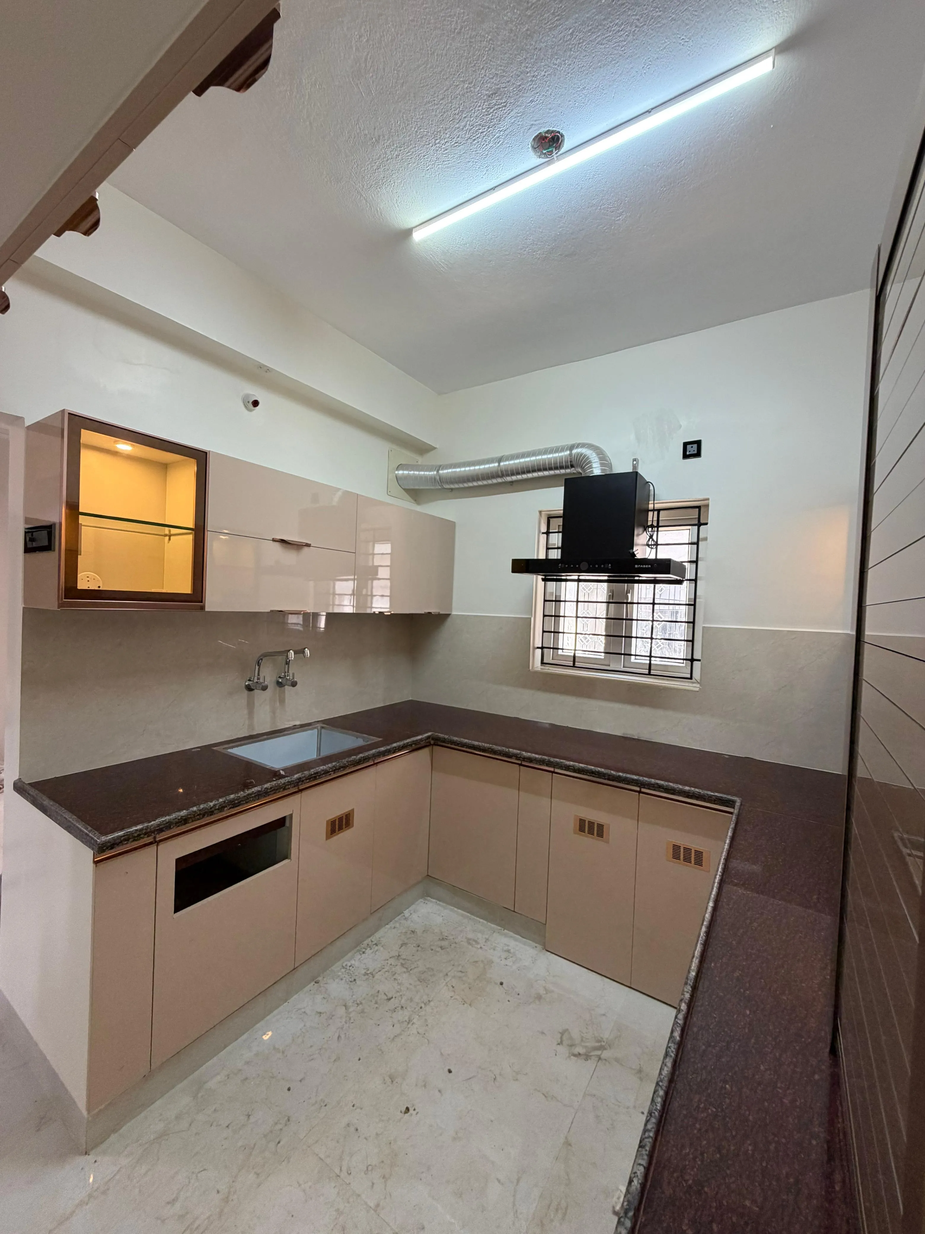 Modular Kitchen with High-Gloss Beige Cabinets and Integrated Chimney Base Cabinets Desk and Decor 