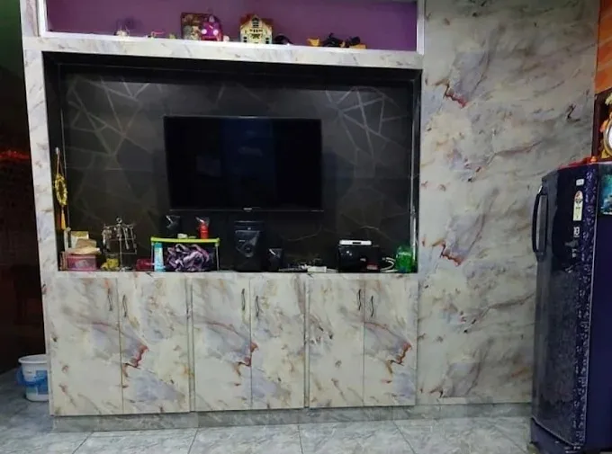 Reception Lobby / Elevator Foyer — Marble Feature Wall TV Unit Focused Design Desk and Decor 