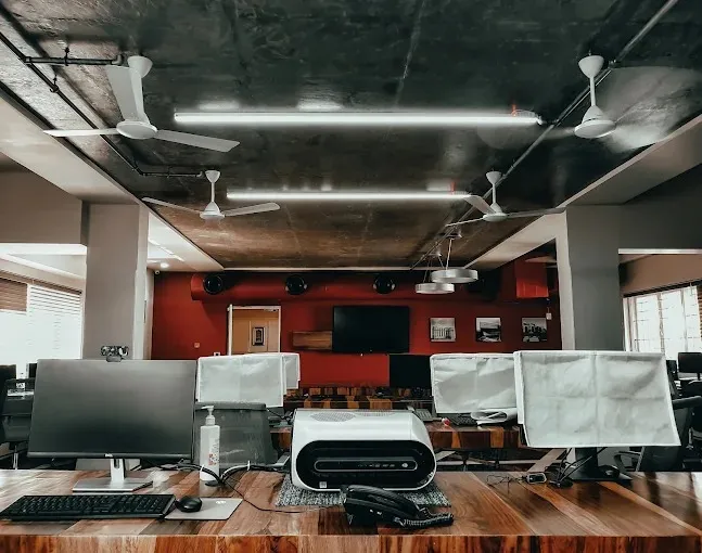Industrial-Style Open Office Workspace Open Workspace Offices Desk and Decor 