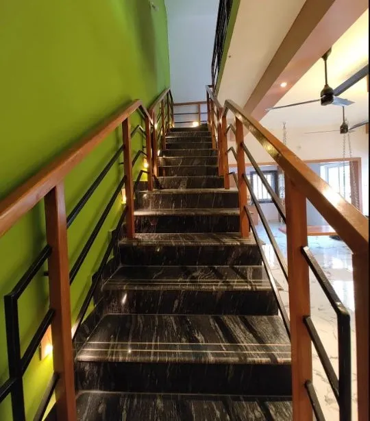 Wooden Handrail Dog-Legged Staircase with Black Marble Treads Staircase Design Desk and Decor 