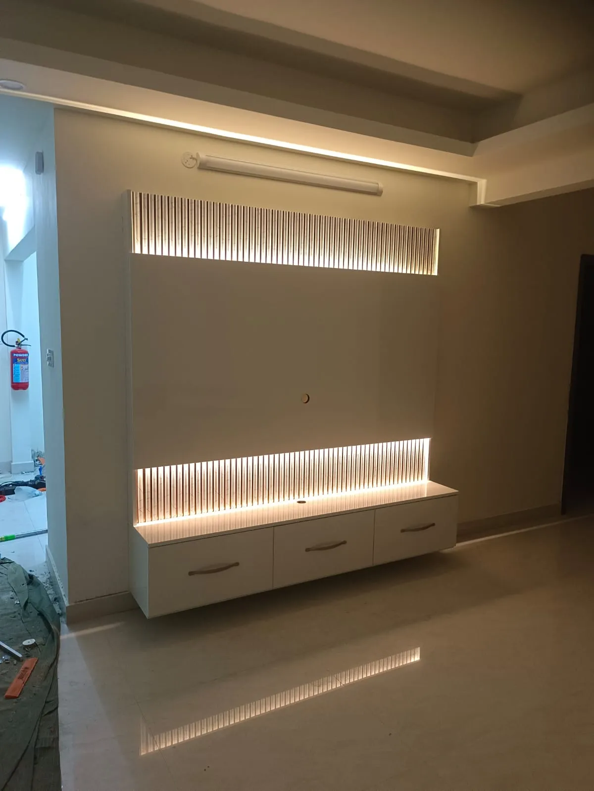 Modern Tri-Tone Master Wardrobe High-Gloss Finish with Integrated LED Vanity Station and Loft Storage Floor Standing TV Units Desk and Decor 