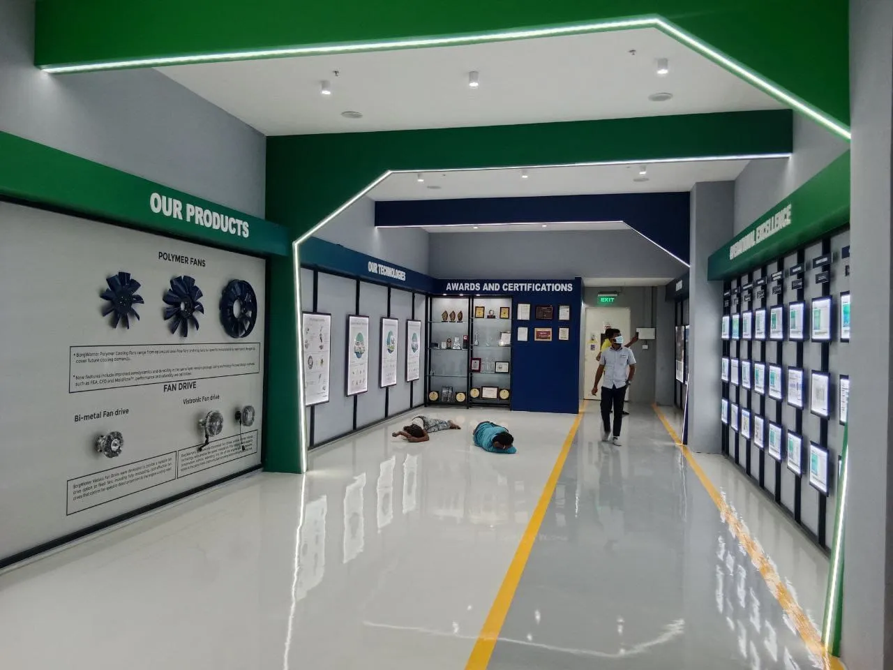 Industrial Product Display Gallery with Integrated 'Our Products' and 'Awards' Zoning Feature Display Units Desk and Decor 
