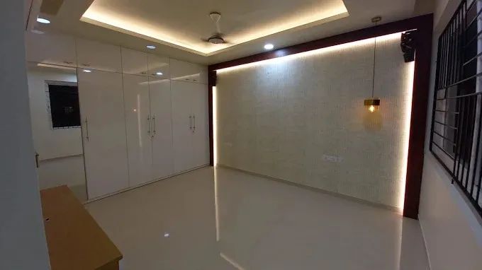 Bedroom with Glossy White Wardrobe & Backlit Feature Wall Modern Living Room Designs Desk and Decor 
