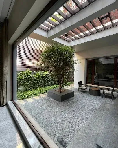 Open-Plan Dining Area with Garden View & Marble Flooring Modern Living Room Designs Desk and Decor 