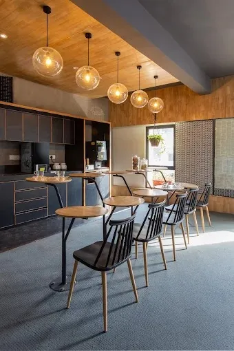 Dining Room with Brass-Inlay Wood Paneling & Green Marble Table Modern Dining Room Designs Desk and Decor 