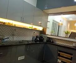 Modular Kitchen with Tall Storage Unit & Marble Backsplash Modular Kitchen Desk and Decor 
