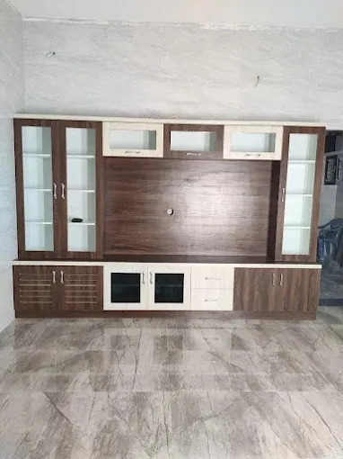 Combination TV & Pooja Unit with Ganesha Motif Cabinets Loft Storage Designs Desk and Decor 