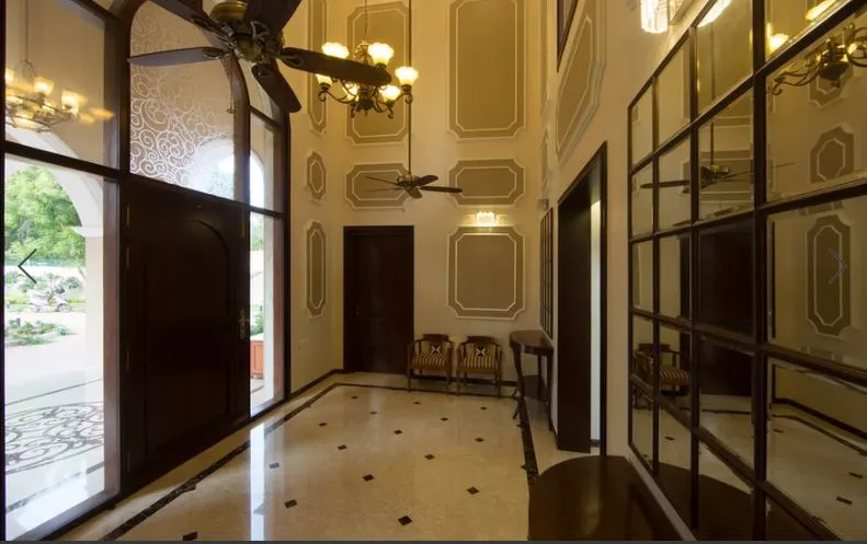 Double-Height Living Hall with Grand Staircase Modern Living Room Designs Desk and Decor 