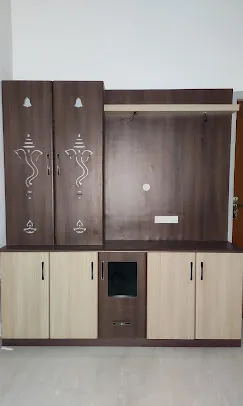 Combination TV & Pooja Unit with Ganesha Motif Cabinets Loft Storage Designs Desk and Decor 