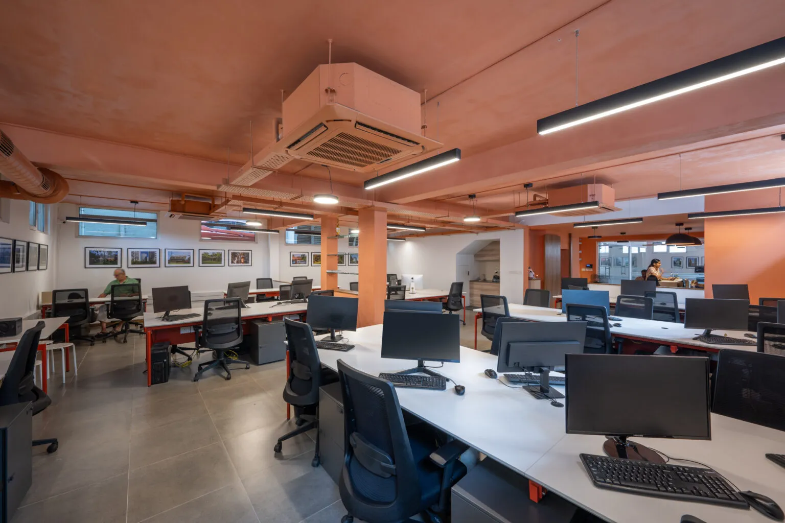 Industrial-Style Open Office Workspace with Exposed Ceiling Modern Office Designs Desk and Decor 