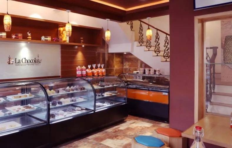 Chocolate Café & Bakery Display Counter with Staircase Modern Cafe Design Desk and Decor 