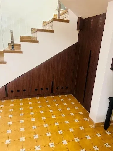 Under-Stair Storage Unit with Wooden Paneling Modern Staircase Desk and Decor 