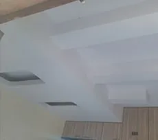 Geometric False Ceiling with Orange Beam Accents Architectural False Ceiling & Lighting Desk and Decor 