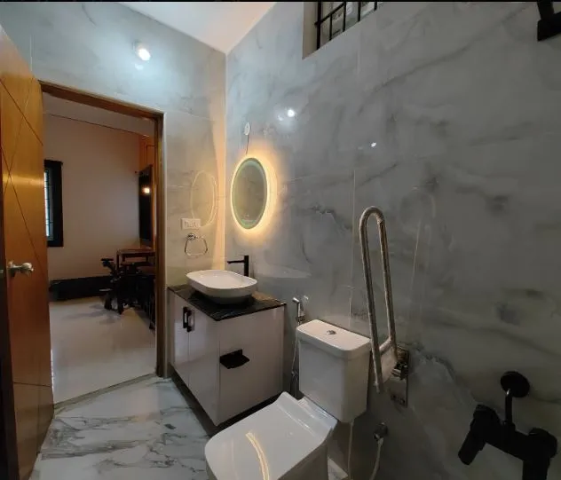 Bathroom with Marble Cladding & Backlit Circular Mirror Modern Bathroom Designs Desk and Decor 