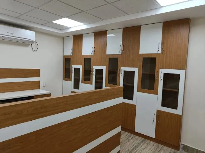 Office Storage Room with Wood-Finish Filing Cabinets & Reception Counter with Modern Office Designs at Deskanddecor