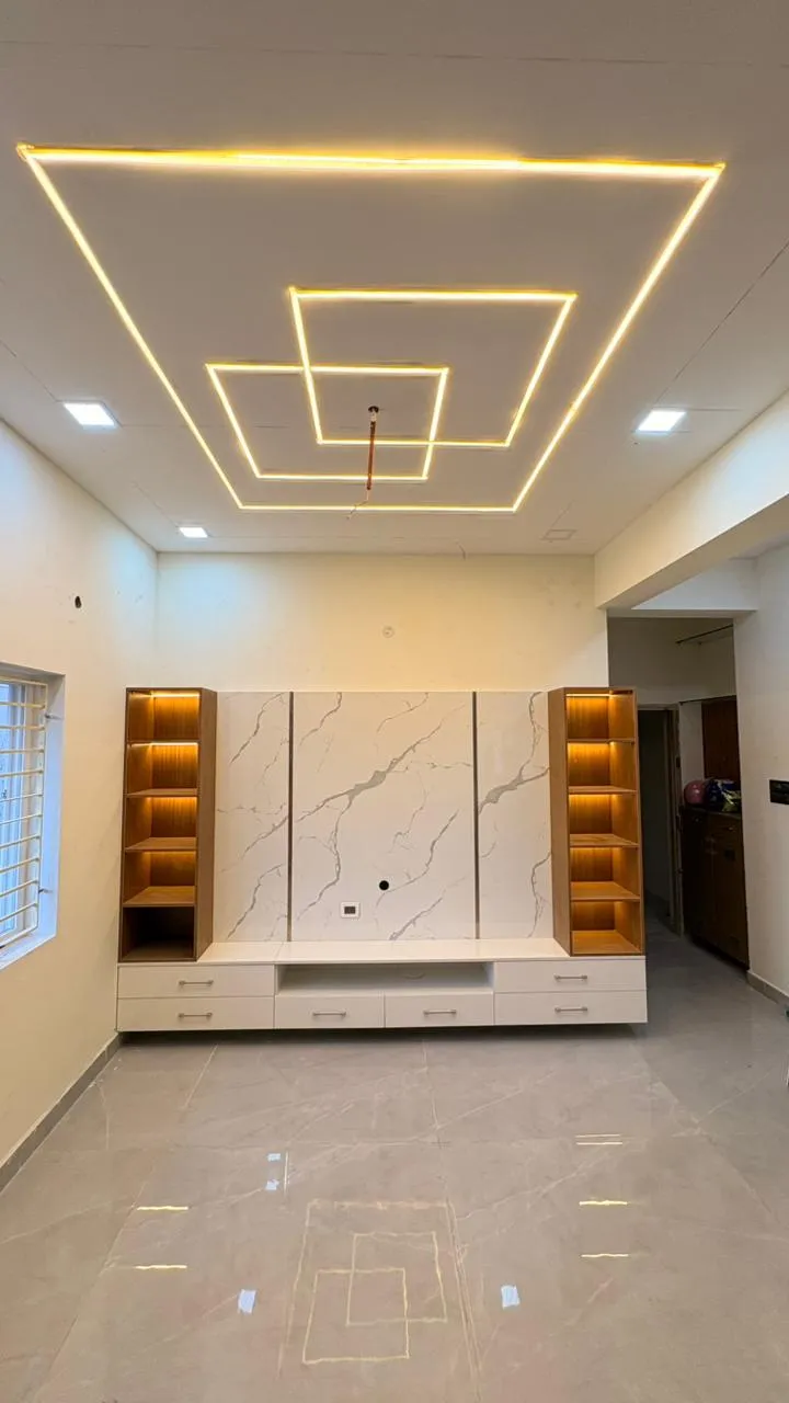 "Modern Luxury: Marble-Texture TV Backdrop with Symmetrical Illuminated Display Towers" with Floor Standing TV Units at Deskanddecor