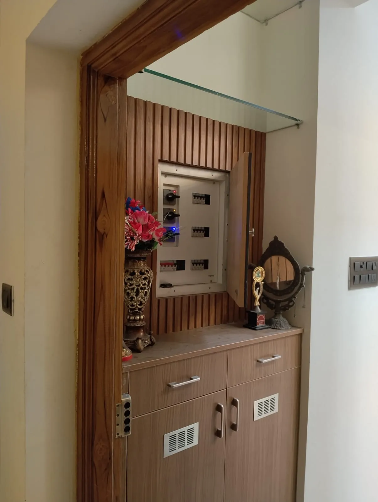 Foyer Solutions Custom Shoe Cabinet with Integrated Electrical DB Concealment and Fluted Wood Accents with Shoe Cabinets at Deskanddecor