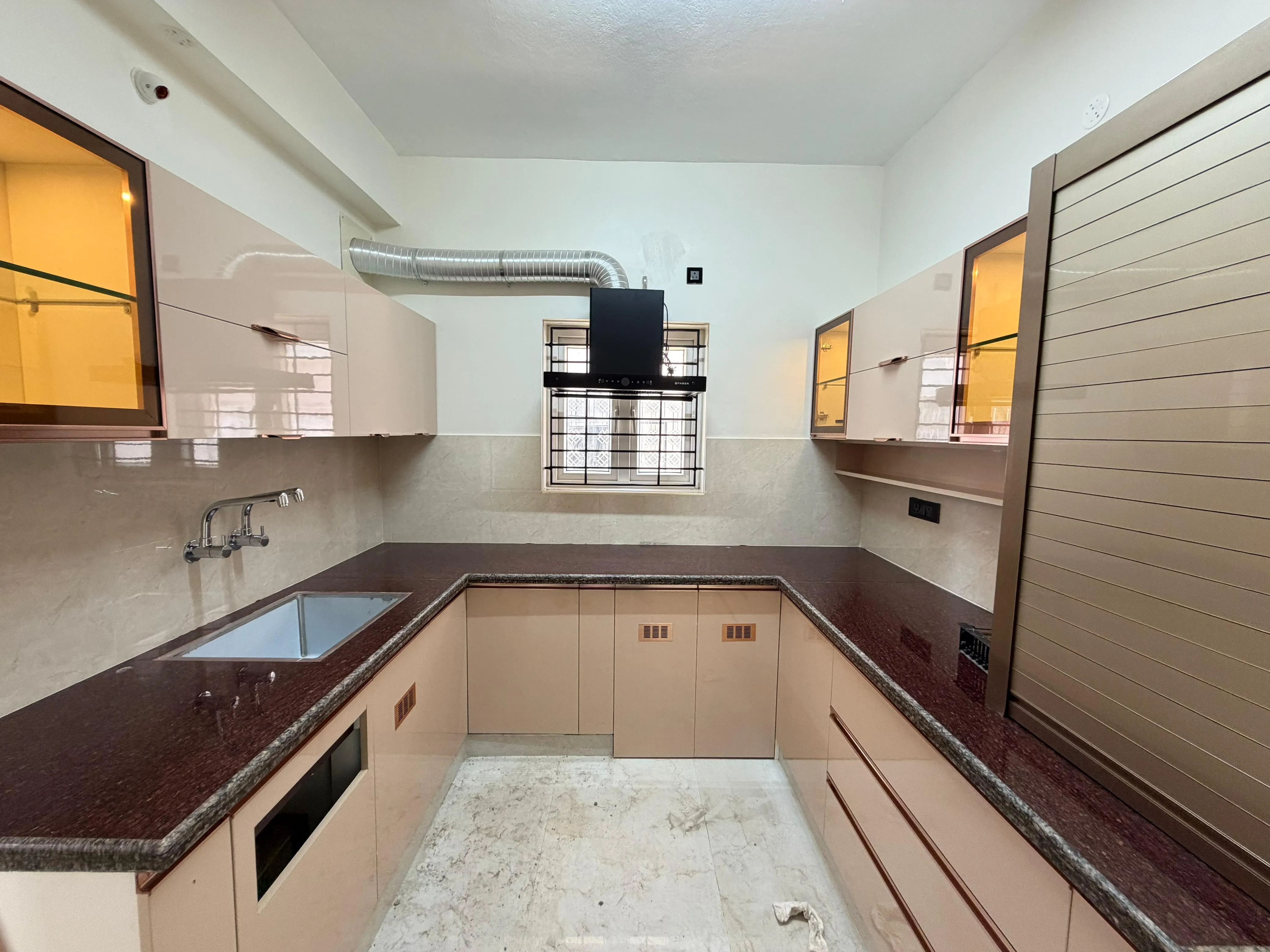 Modern U-Shaped Modular Kitchen with Roller Shutter with Tile Countertops at Deskanddecor