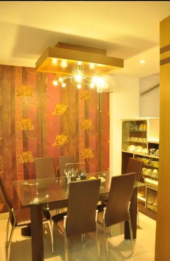 Dining Room with Leaf-Pattern Wallpaper and Box Ceiling Chandelier with Open Dining with Living at Deskanddecor