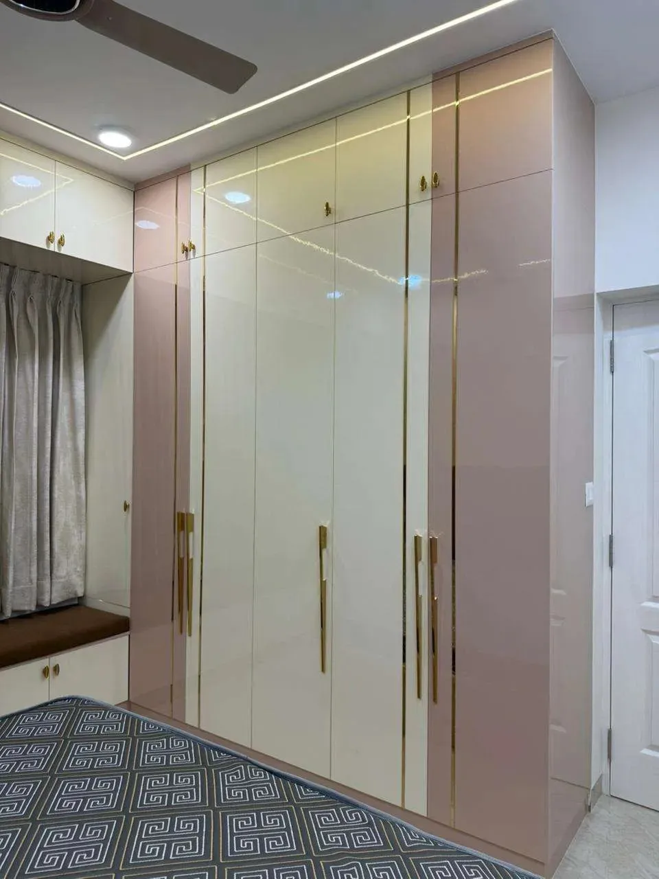 Luxury Glossy Wardrobe with Gold Trim & Loft Storage with Modular Wardrobe at Deskanddecor