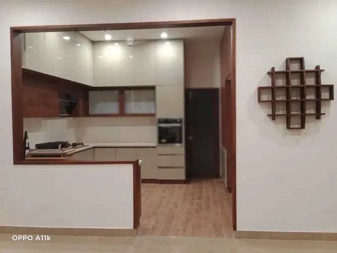 Semi-Open Kitchen with Pass-Through Serving Counter with Modular Kitchen at Deskanddecor
