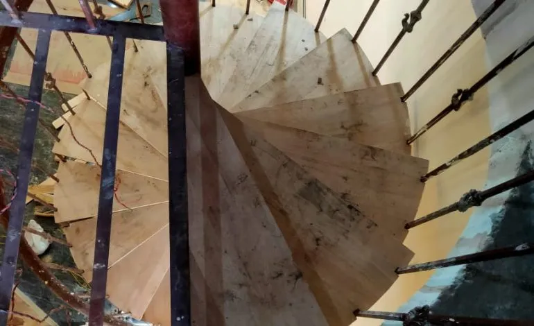 Spiral Staircase with Wooden Treads & Metal Railing (Under Construction) with Modern Staircase at Deskanddecor