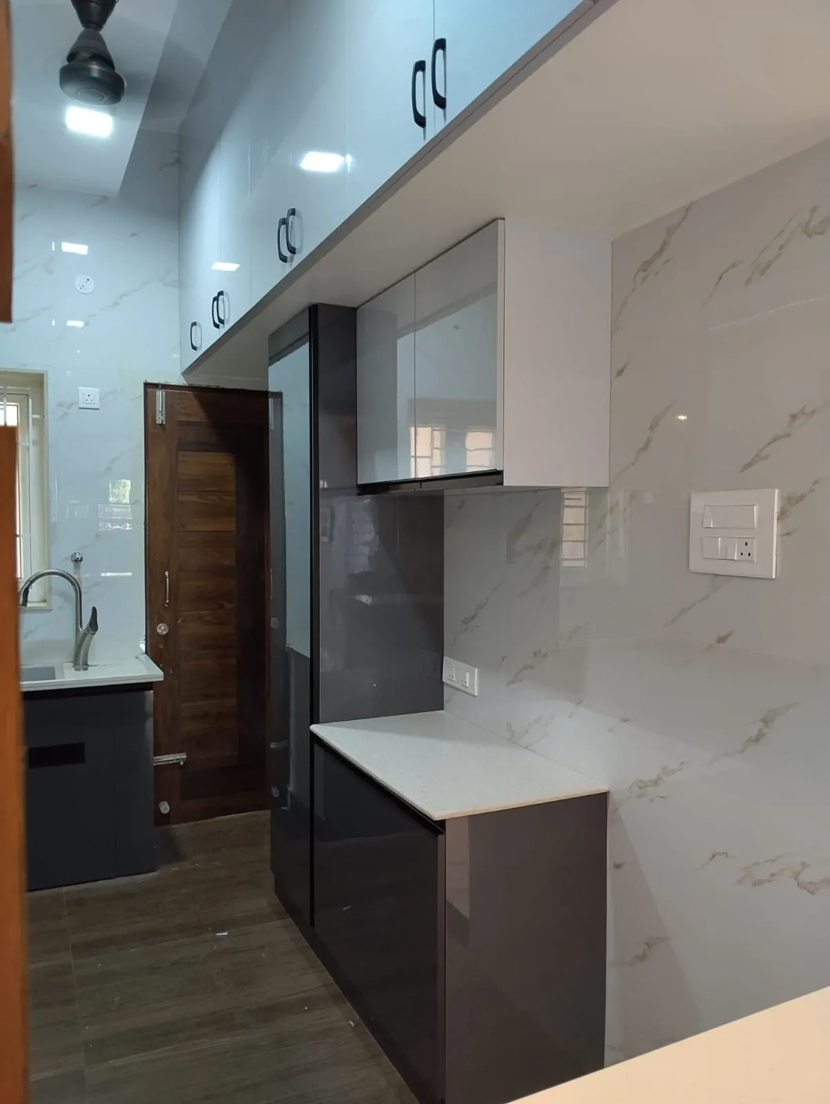 The Urban Pearl Full-Home Turnkey Interior with Wall Cabinets at Deskanddecor