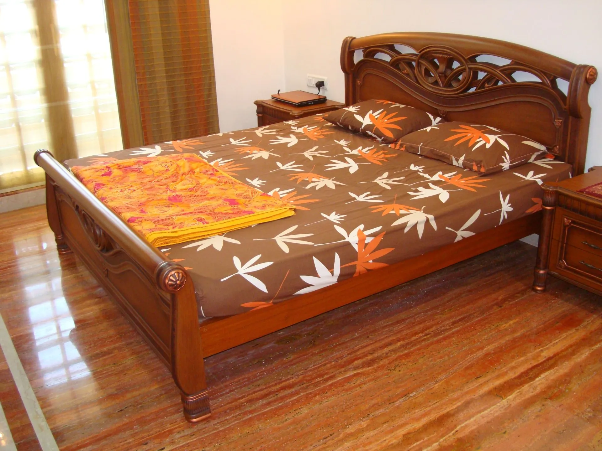 Classic Carved Wooden Bed with Sleigh-Style Frame with Modern Bedroom at Deskanddecor