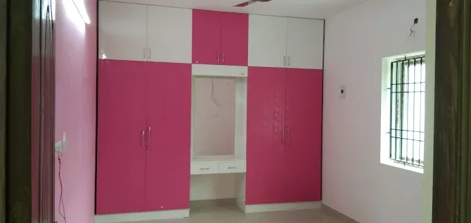 Elegant Wooden Wardrobe and Bedroom Storage with Modular Wardrobe at Deskanddecor