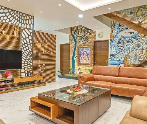 Artistic Living Room with CNC Panel Wall & Mural Staircase Backdrop with Modern Living Room Designs at Deskanddecor
